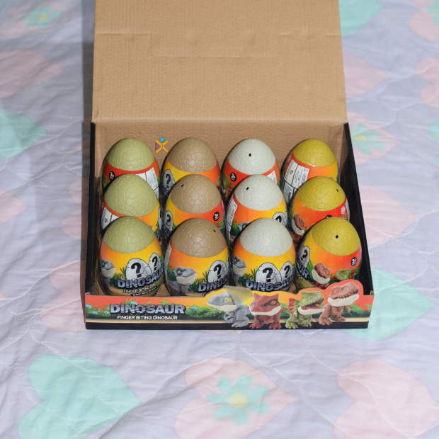 Set Completo: 12 Huevos de Dino Mordelón - Juguete Interactivo
